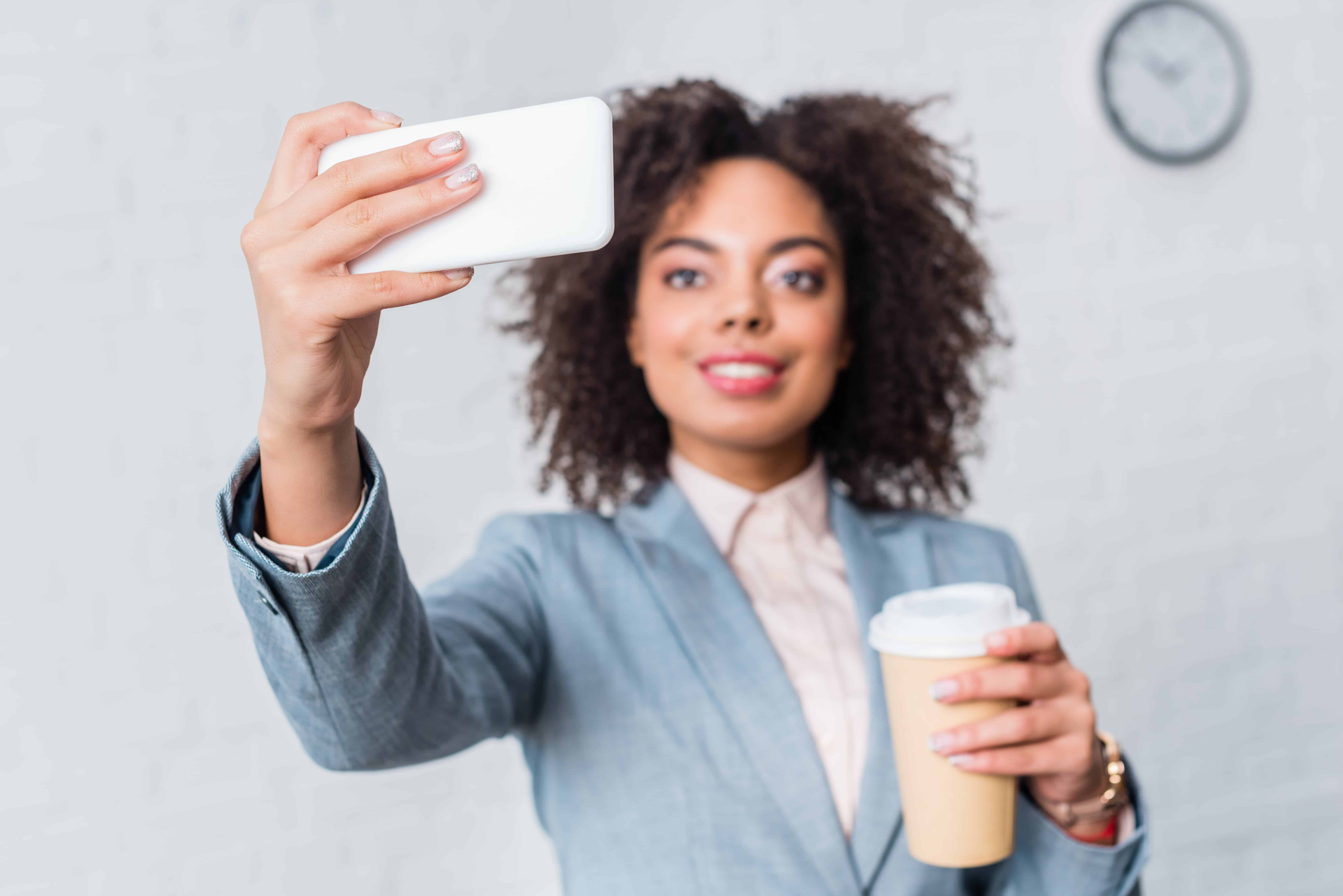 Building a Personal Brand. Woman taking a Selfie.