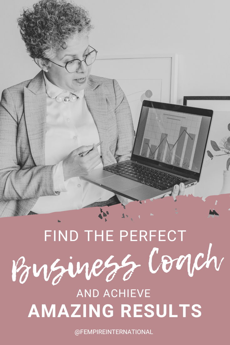 A picture of a female business coach holding a laptop.